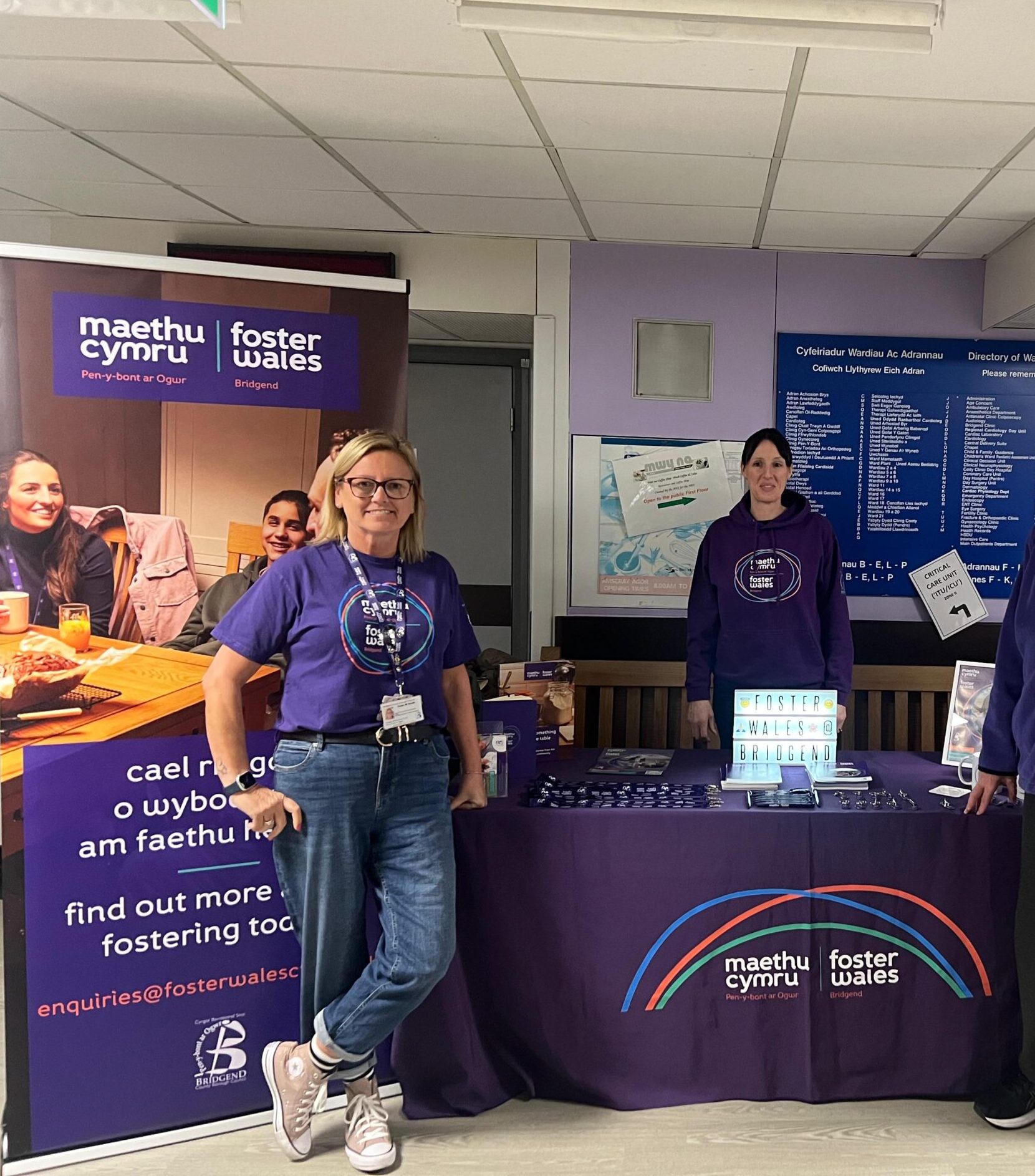 Three people at a recruitment event